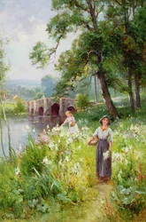 Blumen pflücken am Fluss